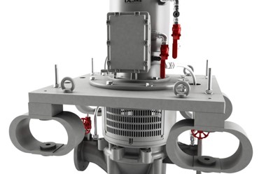 DESMI vertical pump for fluid handling with visible valves and connections.