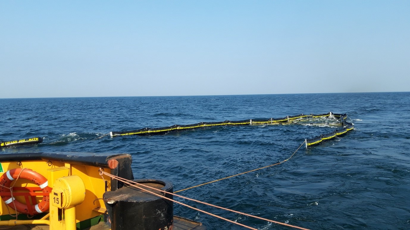 DESMI RO-KITE system deployed in the ocean for oil spill containment.
