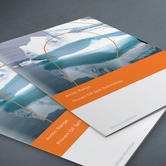 DESMI brochures featuring Arctic Range oil spill technology, with icebergs on cover.