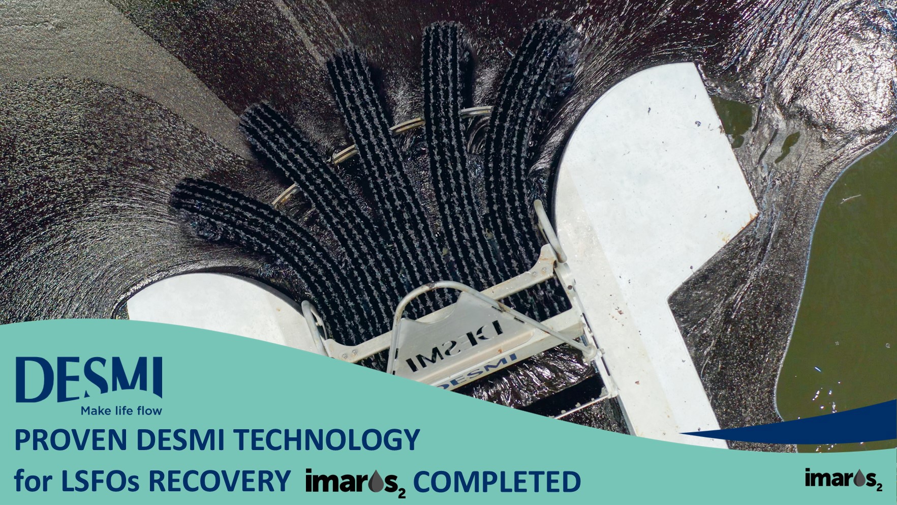 DESMI oil spill recovery skimmer operating in water with visible oil slick.